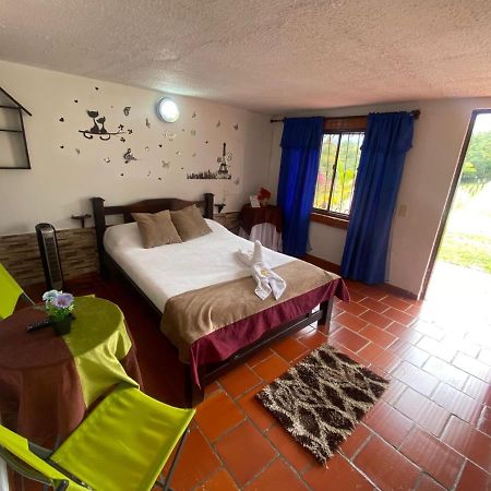 Hotel Campestre La Loma Curití Exteriör bild